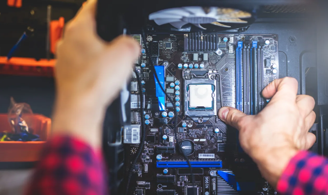 Professional technician repairing a computer